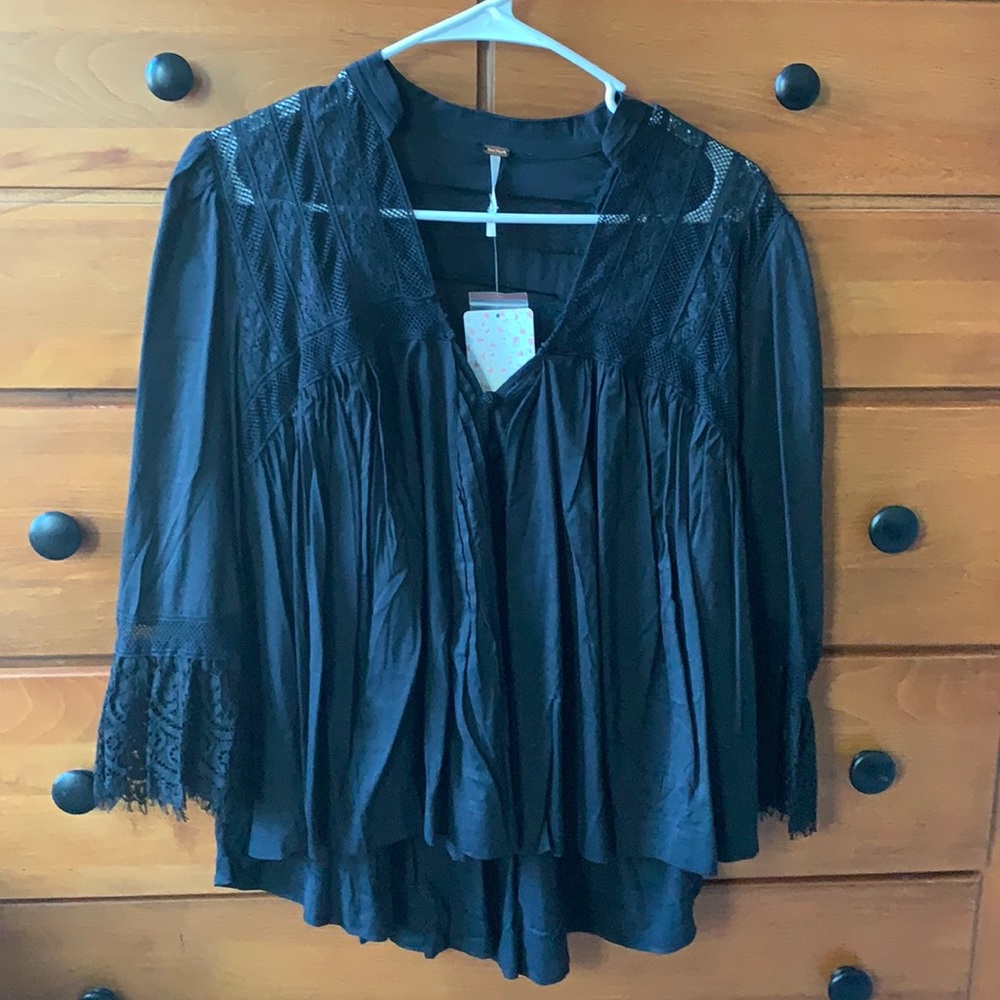 Free people. New with tags. Size xs.